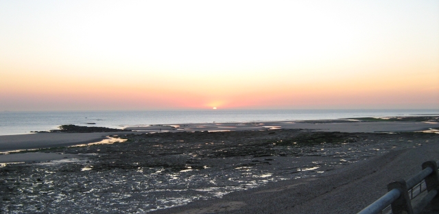 orange sunset over the sea at ambleteuse